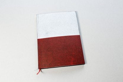 Biało-czerwona okładka książki.